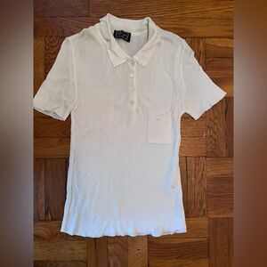 White silky knit polo
Shirt.
